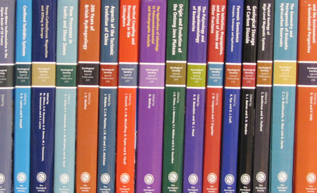 A series of GSL books on a shelf